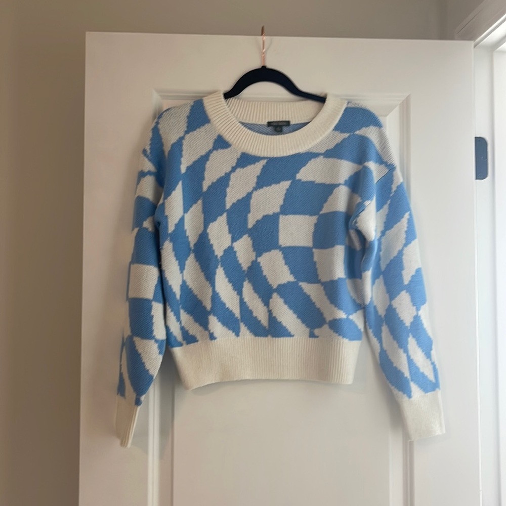 Sky blue and white patterned sweater